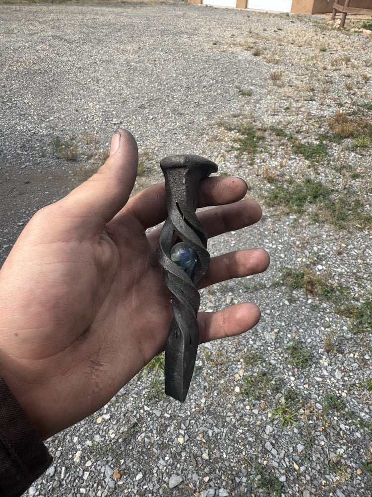 Railroad spike bottle opener